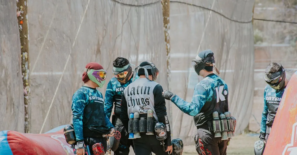 Group of first-time paintball players gearing up and getting tips before their first game