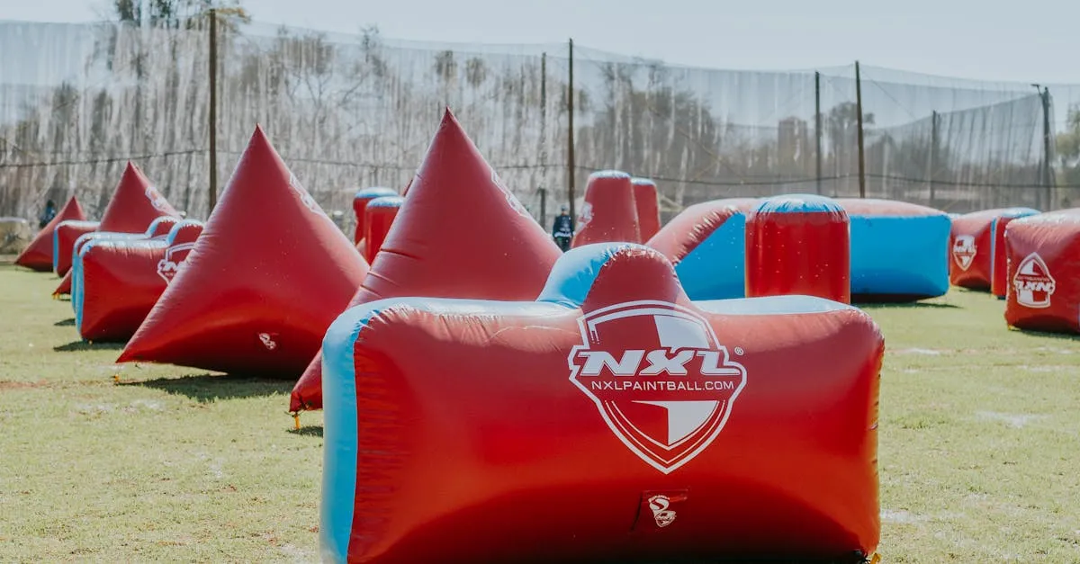 Inflatable red and blue bunkers set up on a paintball field ready for backyard play