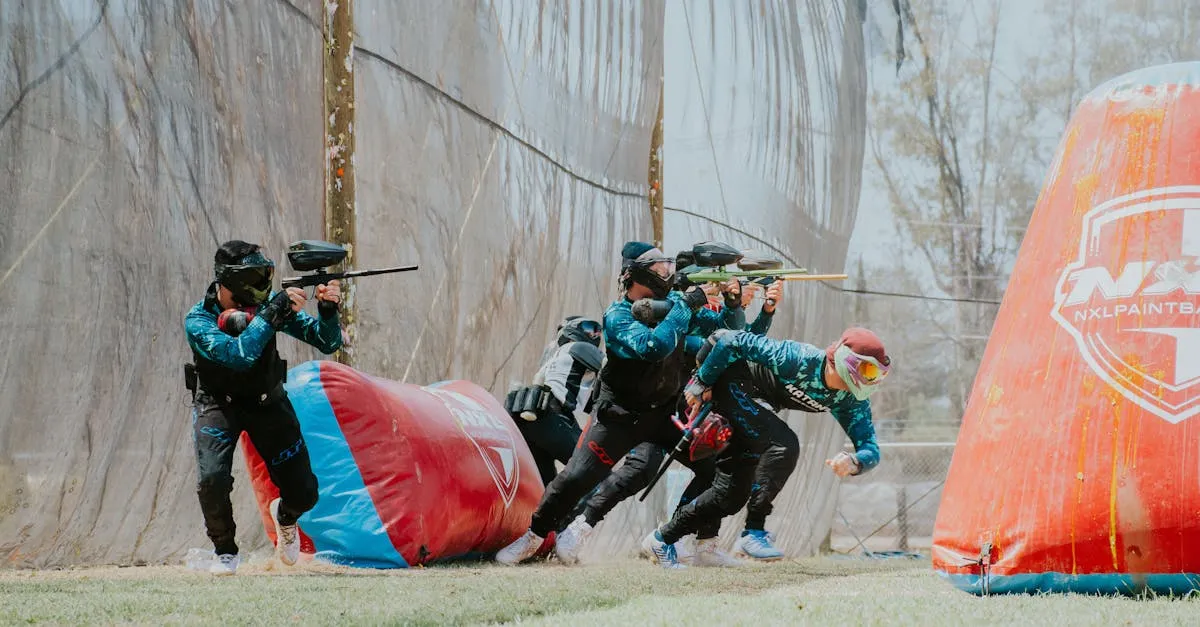 Team of players engaged in an energetic outdoor paintball game, showcasing teamwork and strategy.