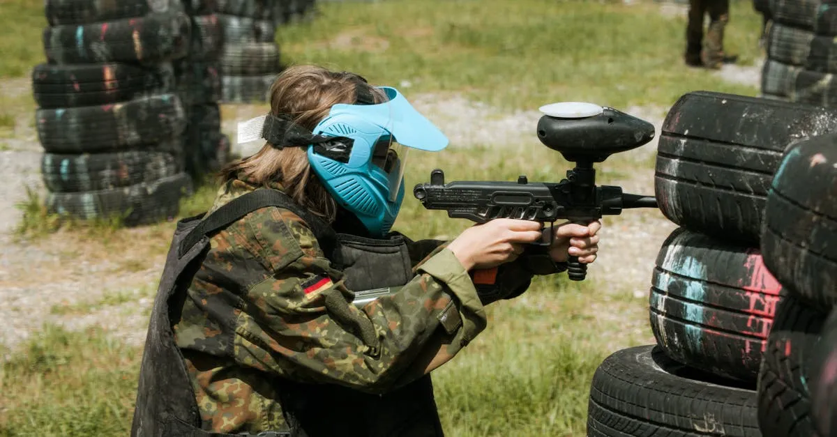 Player in camouflage with a marker comparing Tippmann vs Planet Eclipse brand performance